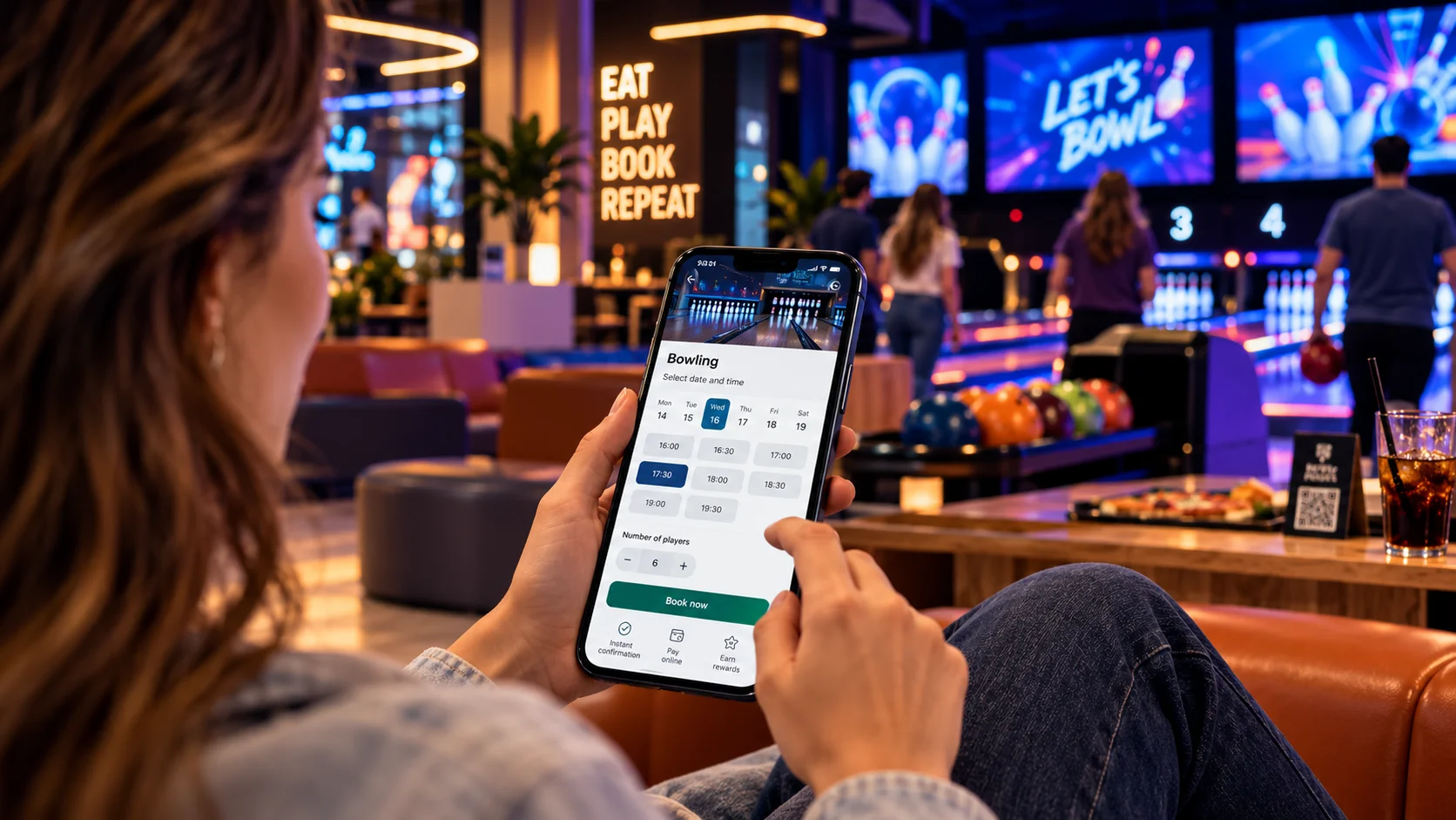 Customer selecting a bowling date and time on a smartphone